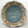 Large bowl with blue glaze and chickadees/ wavy rim