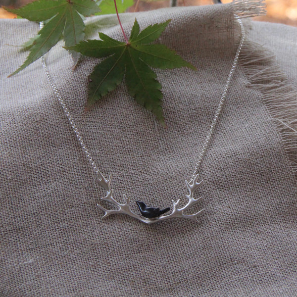 Small antler with squat bird necklace