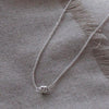 Small antler with squat bird necklace