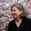 photograph of Ellen Granter with cherry blossoms