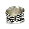 Etched and hammered oxidized silver ring with CZs